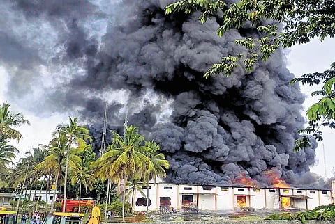 A massive fire engulfs a warehouse at Adakamaranahalli near Nelamangala, on the outskirts of Bengaluru on Tuesday 
