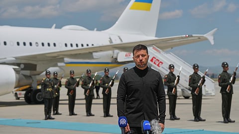 Ukrainian President Volodymyr Zelenskyy talks to journalists as he arrives at Esenboga Airport in Ankara, Turkey, Thursday, May 15, 2025.