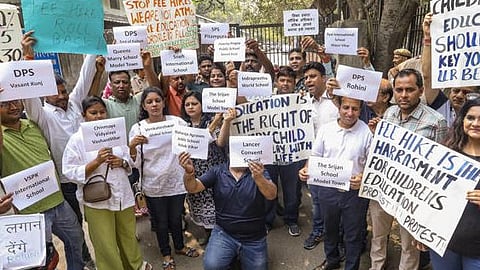 Parents protest against fees hike.