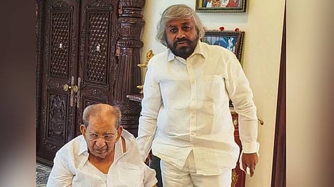 Forest Minister Eshwar B Khandre calls on senior party colleague Shamanuru Shivashankarappa in Davanagere on Thursday.