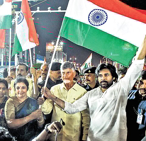 CM N Chandrababu Naidu, Deputy CM Pawan Kalyan, and  BJP State president D Purandeswari hold the national flag during the ‘Tiranga Rally’, held to mark the success of ‘Operation Sindoor’ on the MG Road in Vijayawada on Friday 