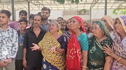 The family members of the deceased infront of the LG hospital in Ahmedabad's Danilimda area.