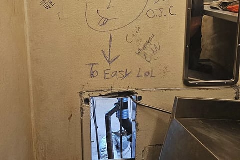 This photo obtained by The Associated Press on Friday, May 16, 2025, shows an opening inside a cell at the Orleans Justice Centre in New Orleans.