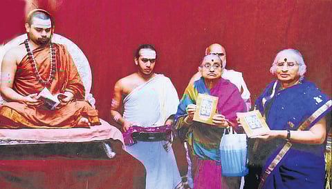 Srungeri seer sri Bharati teertha swamy releasing book penned by satyaveni sisters