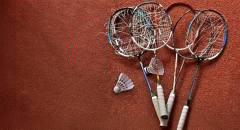 What are the reasons behind Indian badminton's descent from the glory days?
