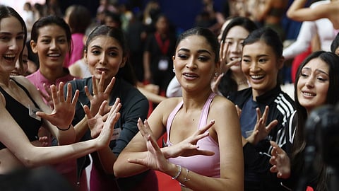 Miss World 2025 contestant from India, Nandini Gupta dances with other contestants