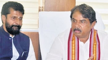 LoP in the Assembly R Ashoka addresses a press conference, as BJP MLC CT Ravi looks on, in Chikkamagaluru on Sunday