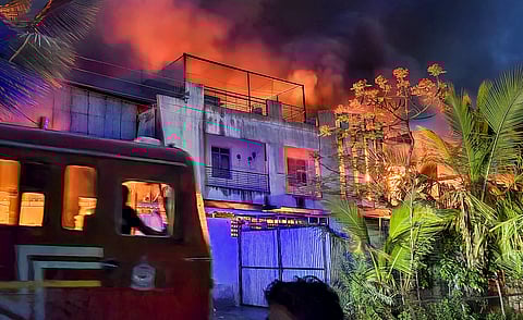  Smoke billows after a fire broke out at a factory, at MIDC area in Solapur, Maharashtra, Sunday, May 18, 2025.