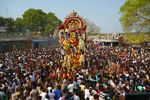 Aravan, the deity of Koothandavar temple, being brought out in a chariot.