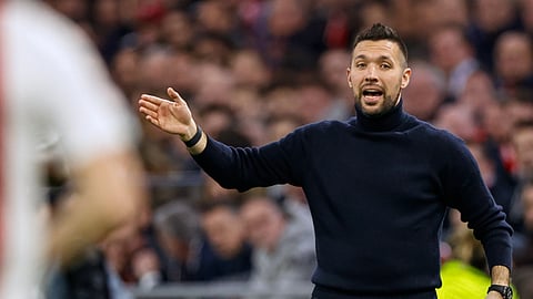 Ajax's head coach Francesco Farioli gives instructions to his players during the Europa League round of 16 first leg football match between Ajax and Eintracht Frankfurt at the Johan Cruyff Arena in Amsterdam, Netherlands.