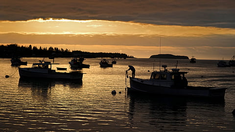 A lobsterman unties his boat before heading out to fish in Jonesport, Maine, April 27, 2023. 
