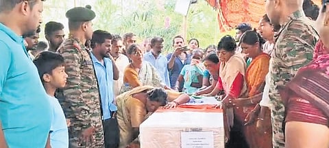 Family members grieve the death of the Army jawan in Narsampet town, Warangal district, on Tuesday.