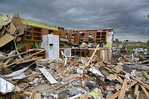 The remains of a kitchen surrounded by debris after severe storms in the Sunshine Hills neighbourhood in London, Ky., Monday, May 19, 2025.