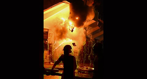 Fire engulfed the Calicut Textiles shop in moffusil bus stand in Kozhikode.