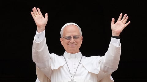 Pope Leo XIV appears at the central balcony of St. Peter's Basilica for his first Sunday blessing after his election, in St. Peter's Square at the Vatican, May 11, 2025.