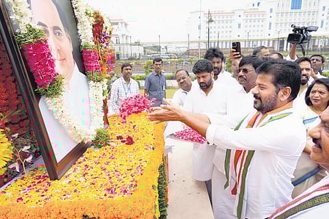 Chief Minister A Revanth Reddy, along with Congress leaders, pays floral tributes to former prime minister Rajiv Gandhi on his death anniversary on Wednesday