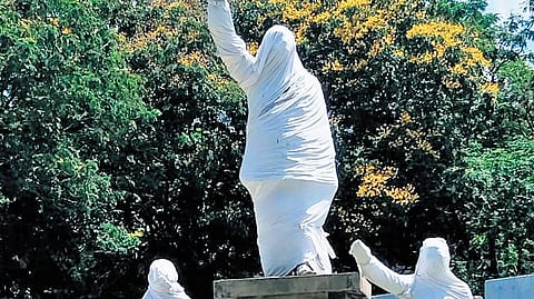 The statues of Mahatma Gandhi, Dr BR Ambedkar and YS Rajasekhara Reddy are wrapped in white cloth in Hyderabad.