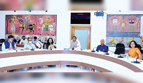 CM Mohan Charan Majhi reviewing the PM-Janman scheme along with chief secretary Manoj Ahuja and others during a high-level meeting on Wednesday 