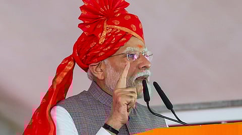 Prime Minister Narendra Modi addresses a gathering during the inauguration and foundation stone laying of various development projects, in Bikaner district.