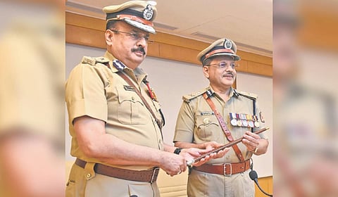 DG & IGP Alok Mohan hands over the baton to his successor Dr MA Saleem in Bengaluru on Wednesday 
