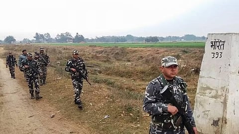 Shashtra Seema Bal (SSB) jawans patrol along the India-Nepal border near Raxaul in East Champaran district. 