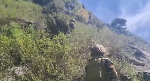 Security forces during an ongoing encounter and search operation in Jammu and Kashmir’s Kishtwar district on Thursday, May 22, 2025.