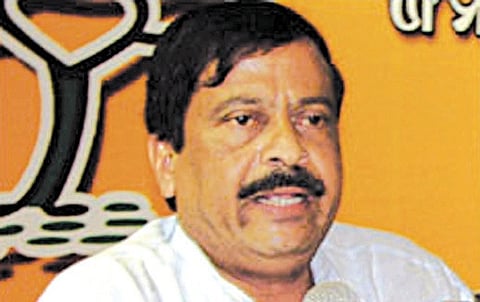 Revenue minister Suresh Pujari.