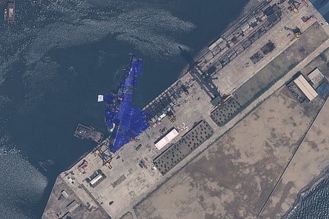 This satellite image provided by Airbus DS, shows a blue tarp covering a North Korean destroyer after it suffered a failed launch while it was being put to sea in Chongjin, North Korea, Thursday, May 22, 2025.