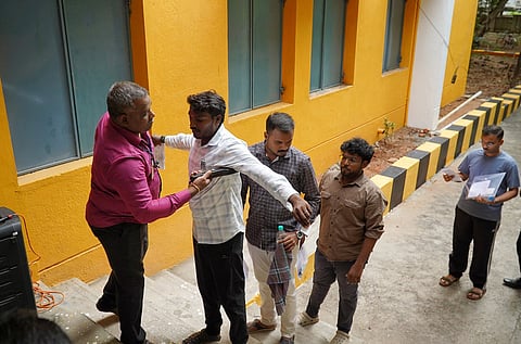 There were no signs of suspicion or alarm when the candidate passed through metal detectors at the entrance.