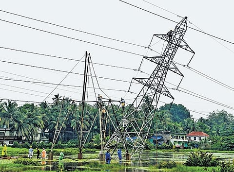 A high tension tower collapsed in heavy rain In Kozhikode on Saturday