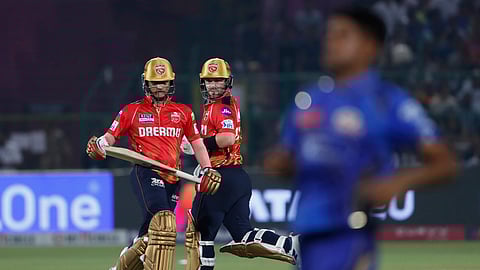 Punjab Kings' Priyansh Arya, left, and batting partner Josh Inglis run between the wickets to score during the Indian Premier League cricket match between Punjab Kings and Mumbai Indians at Sawai Mansingh Stadium in Jaipur, India, Monday, May 26, 2025.