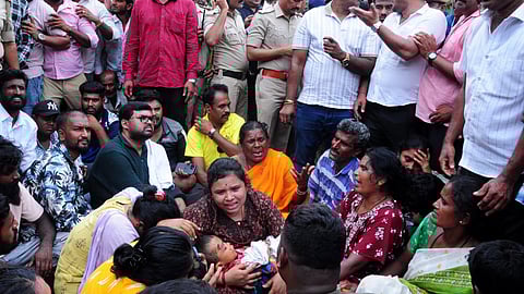 Family protested against police over the death of a three-year-old child During a traffic violation inspection in Mandya on Monday. 