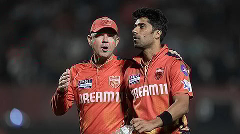 Punjab Kings' coach Ricky Ponting, left, chats with Punjab Kings' Shashank Singh during the Indian Premier League cricket match between Lucknow Super Giants and Punjab Kings at Himachal Pradesh Cricket Association Stadium in Dharamshala, India, Sunday, May 4, 2025.
