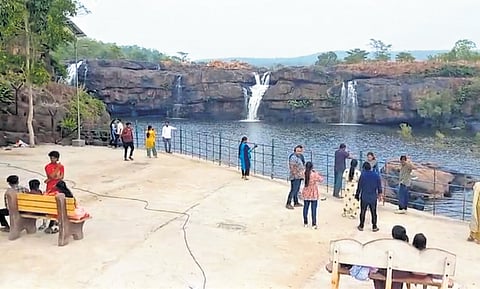 Tourists take in the beauty of the Bogatha Waterfalls which have sprung to life following copious rains in the upper catchment areas in Chhattisgarh