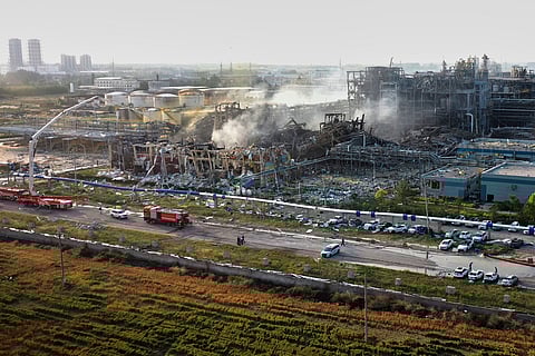 In this photo released by Xinhua News Agency, Firefighters extinguish fires at the explosion site of a chemical plant in Gaomi, in east China's Shandong Province, Tuesday, May 27, 2025.