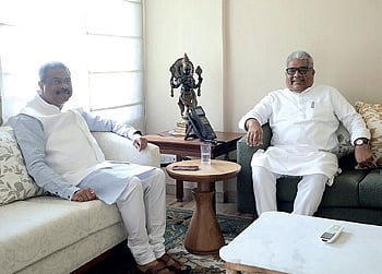 Dharmendra Pradhan with Environment minister Bhupender Yadav 
