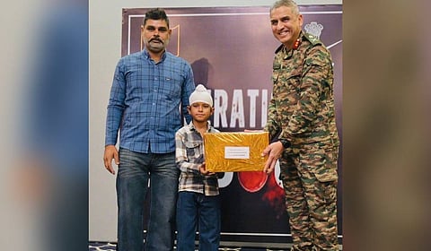 Major General Ranjit Singh Manral, General Officer Commanding of the 7th Infantry Division (Golden Arrow Division), honoured 10-year-old Shravan Singh.