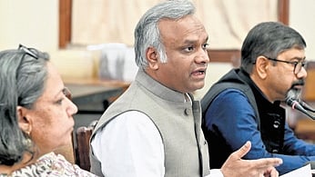 RDPR Minister Priyank Kharge speaks to reporters on Thursday.