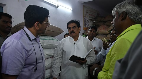 Civil Supplies Minister Nadendla Manohar inspects a ration shop at Madhuranagar in Vijayawada on Thursday