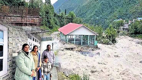 Tahsildar Kurmanatharao along with his family at a hotel in Gangtok.