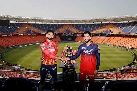 Punjab and Bengaluru captains Shreyas Iyer and Rajat Patidar with the IPL trophy ahead of the final on Monday  