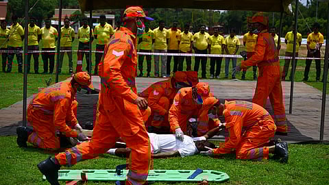  NDRF personnel demonstrate rescue training infront of Civil Defence personnel as a six-day long Training of Trainers (ToT) workshop kicked off for Civil Defence Volunteers at OFDRA Baramunda in Bhubaneswar on Sunday.