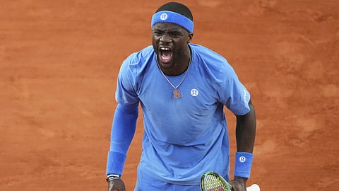 Frances Tiafoe of the US celebrates beating Germany's Daniel Altmaier during their fourth round match of the French Tennis Open, at the Rolland-Garros stadium, in Paris, Sunday, June 1, 2025.
