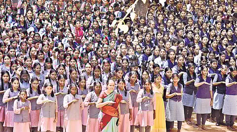 Students of Perunthalaivar Kamarajar Government Girls Higher Secondary School in Ambattur during the assembly. 