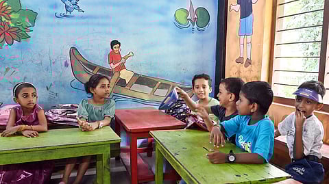 Laughs fill the classroom as lessons commence in Kerala schools