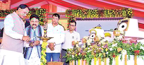 CM Mohan Charan Majhi lighting the lamp at the event on Tuesday.