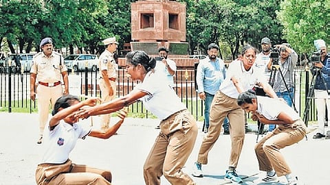 Women constables from the newly created Swift Women Action Team, demonstrate how to safely control women and arrest them during the protests at Goshamahal police stadium in Hyderabad.