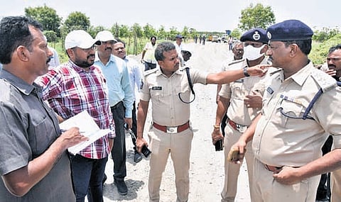 Guntur In-charge Collector Bhargav Tej, along with SP Satish Kumar, inspects arrangements for Vanamahotsavam at Ananthavaram village.