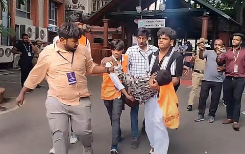 An injured being taken for treatment following chaos near the Chinnaswamy Stadium, after a large number of fans gathered for the felicitation of IPL 2025 winning Royal Challengers Bengaluru team, in Bengaluru, Karnataka, Wednesday, June 4, 2025.
