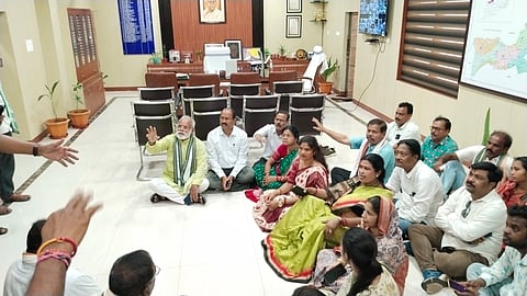 BJD members staging dharna inside the collectors office on Wednesday